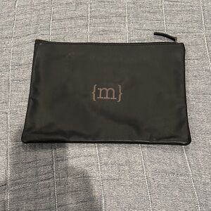 Black Leather Pouch with “m” initial.